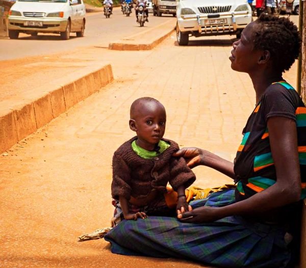 Woman in street with child